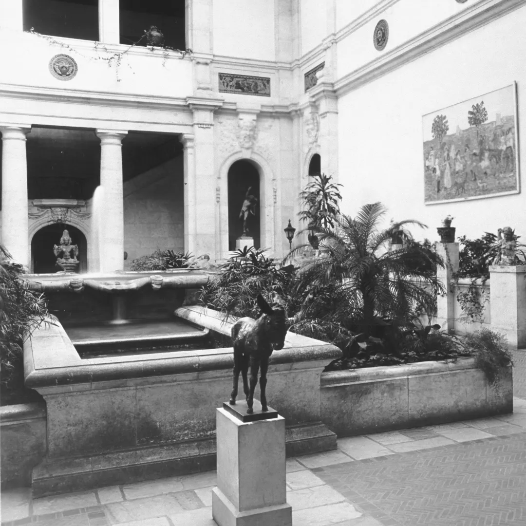 Artie the Donkey on view in Rivera Court in 1928, just a few years before the murals were painted.