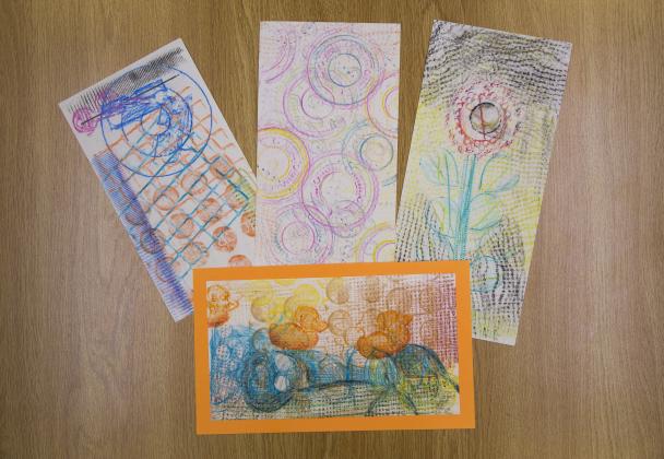 Four crayon rubbing examples made in the DIA art-making Studio