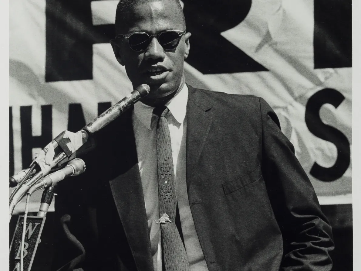 “Malcolm X Speaks at a Rally in Harlem (at 115th St. & Lenox Ave.), New York, September 7, 1963,” 1963, Adger Cowans, gelatin silver print. Detroit Institute of Arts
