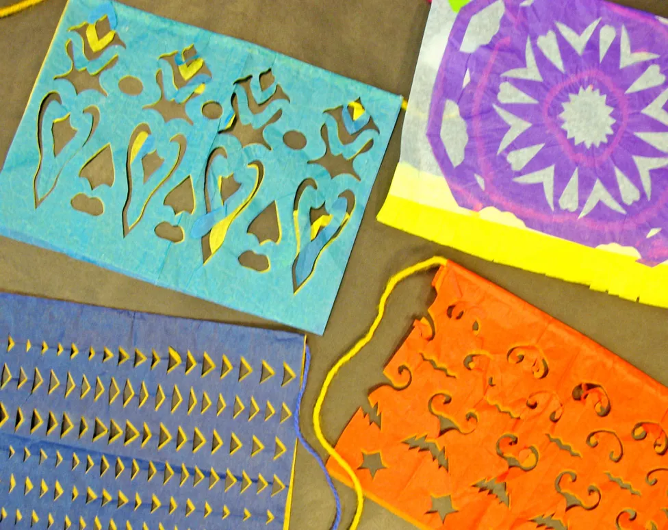 Examples of papel picado made in the DIA art-making Studio