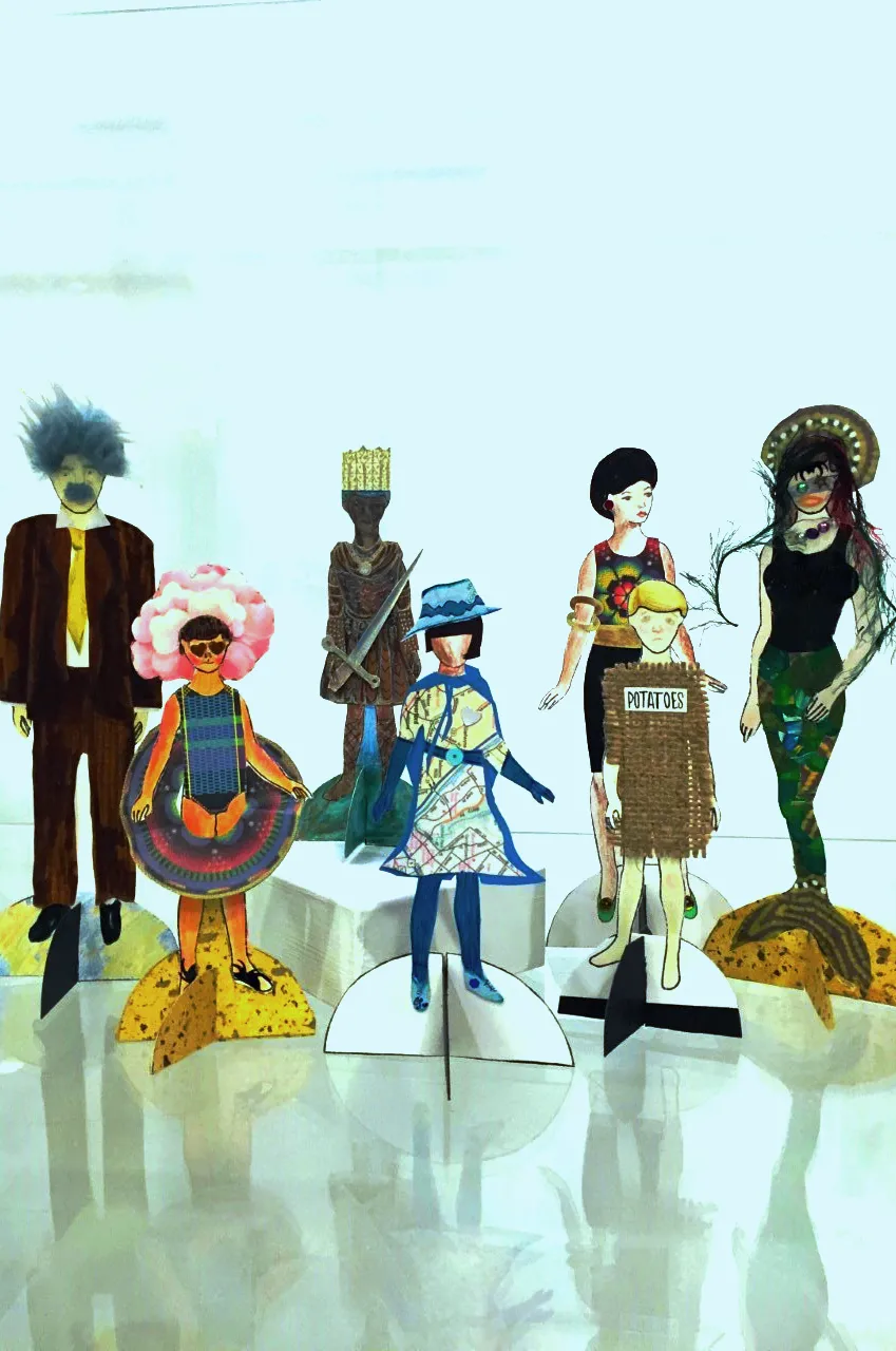 Examples of paper dolls made in the DIA's Art-Making Studio
