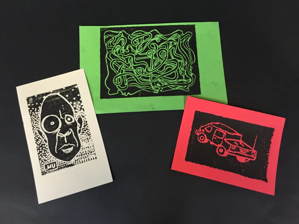Examples of printmaking using black ink made in the DIA's Art-Making Studio during Drop-In Workshops