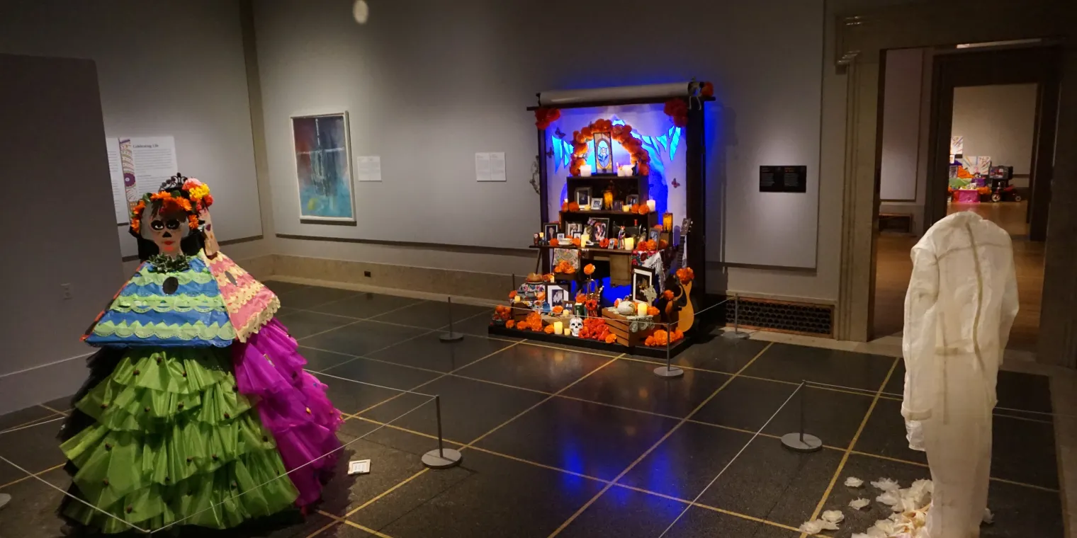 Ofrenda altars set up in the DIA galleries for the 2023 installation of Ofrendas: Celebrating el Dia de Muertos.